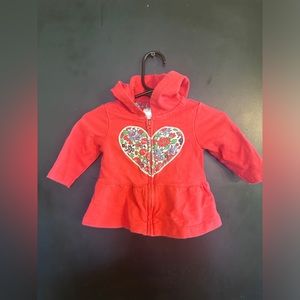 Cute dark pink jacket with heart. 3 month, made by Carter’s. Great condition.